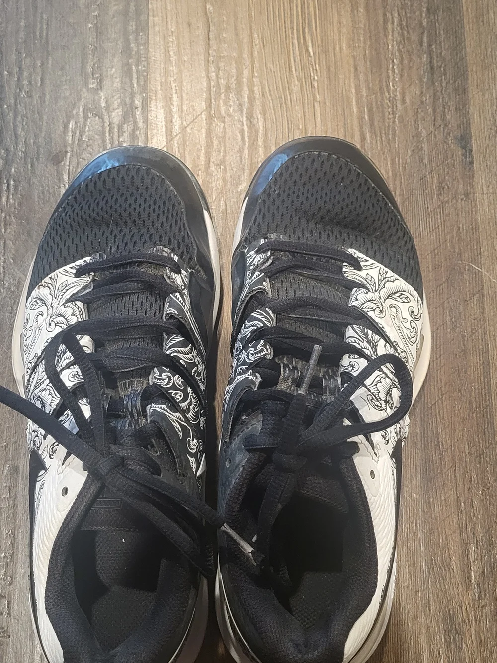 These are Nike Air Zoom Vapor X in the white/black 
